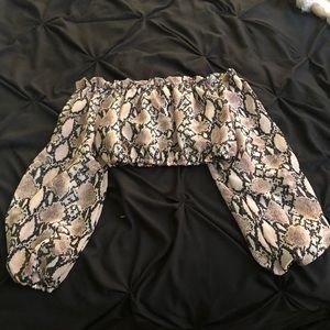 Off the shoulder tube top, can be a bathing suit cover up or a top, never worn